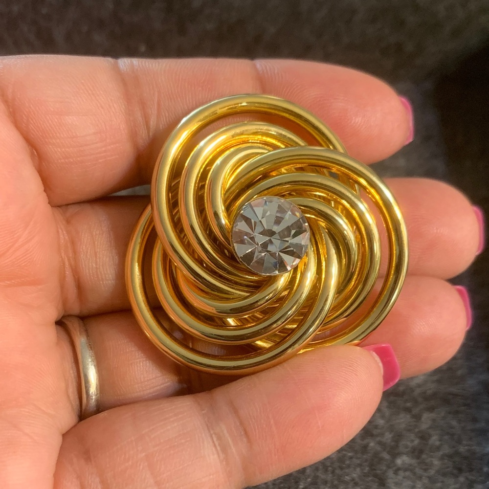 Elegant Gold Spiral Brooch